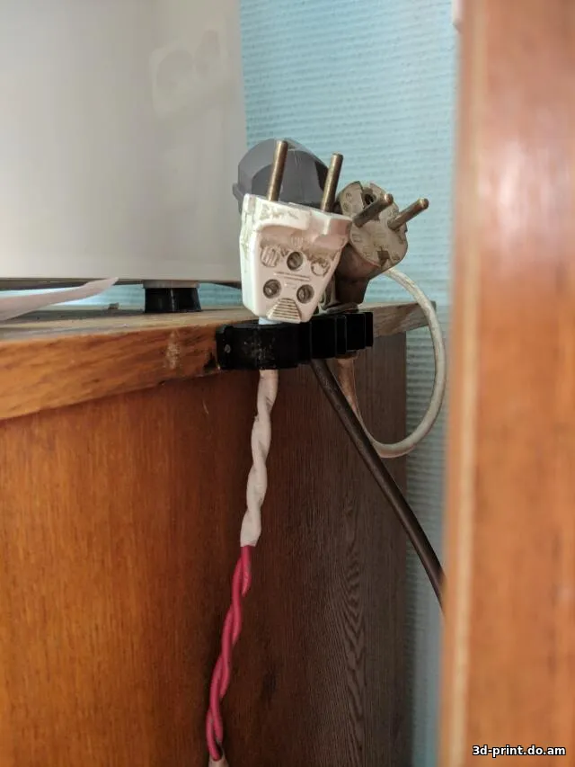 3D-модель "Держатель для вилки розетки" 3D-модель "Держатель для вилки розетки"