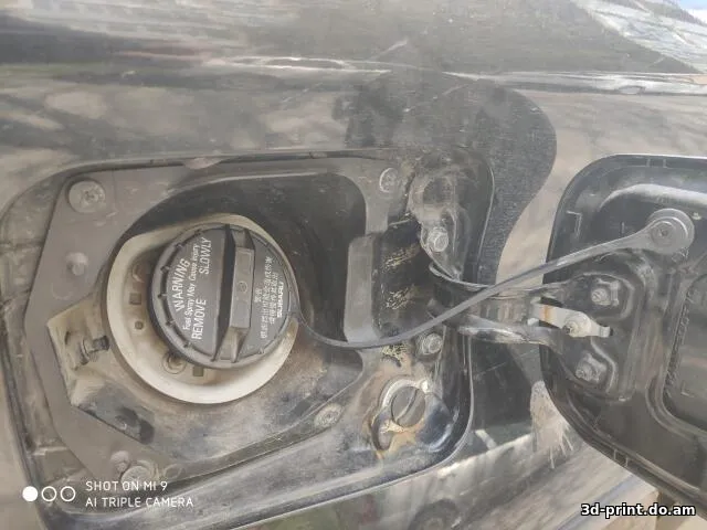 3D-модель "Поводок крышки топливного бака для SUBARU Tribeca"